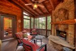 Reel Creek Lodge -  Covered Outdoor Fireplace w/ Plush Seating Options